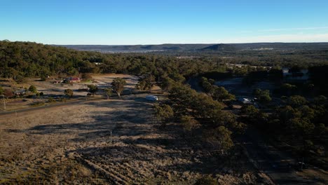 Aerial-over-rural-part-of-Stanthorpe-under-frost,-Queensland-in-the-early-morning-in-winter