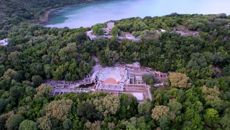 Aerial-of-Butrint-National-park,-archeological-site-with-old-roman-amfitheater