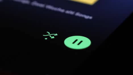 Play-and-shuffle-button-of-Spotify-app,-close-up-view