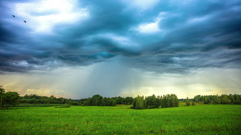 Countryside-cloudscape-at-sunset-during-a-rainstorm---time-lapse