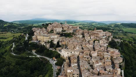 Wide-drone-shot-of-Montepulciano,-Tuscany-in-Italy's-rural-countryside