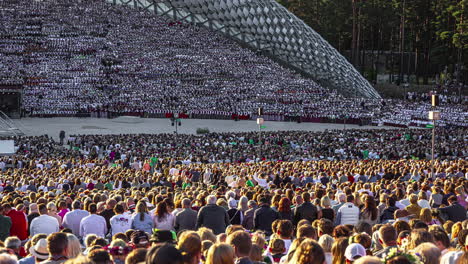 Latvian-Song-and-Dance-Festival-Timelapse-of-Crowd-Gathered-Watching-an-Outdoor-Open-Air-Event