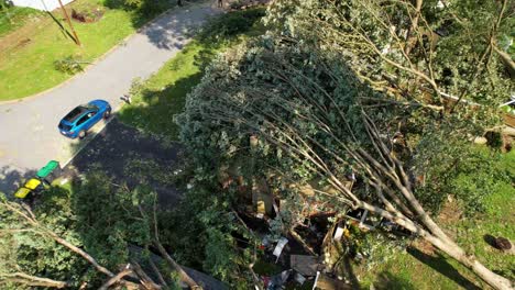 rising-drone-shot-of-tornado-wind-damage-to-home