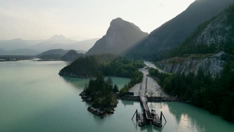 Aerial-view-of-ferry-terminal-and-Stawamus-Chief,-Squamsih-sunrise