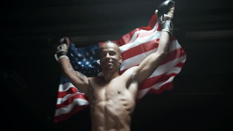 strobed-slow-motion-video-of-a-boxer-proudly-showing-the-american-flag-after-he-won-a-hard-boxing-fight-for-his-country