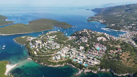 Syvota-Islands,-Hotels,-Boats-and-Beaches-in-Ionian-Sea,-Epirus,-Greece-Mainland---Aerial-Pan-Left