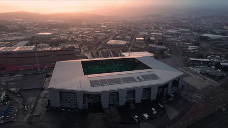 drone-shot-over-Geoffroy-Guichard-Stadium-at-sunrise-in-Saint-Etienne-City,-Rhone-Alpes,-France