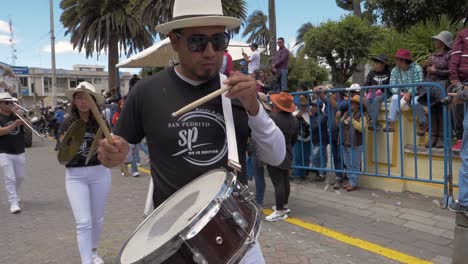 Feel-the-rhythm-and-energy-as-a-band-of-musicians-skillfully-plays-drums-during-the-vibrant-Chagra-Processional-Parade