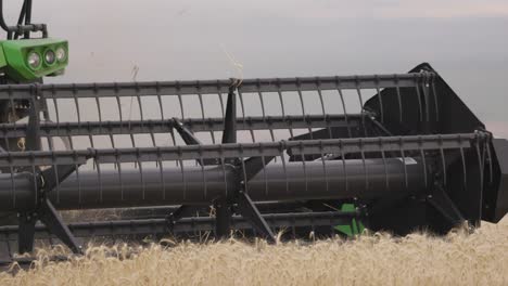 Rural-Agriculture:-Green-Combine-Harvester-in-Wheat-Field