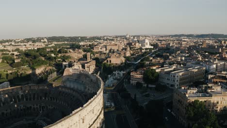 Drone-shot-over-the-Roman-Colosseum-at-sunset