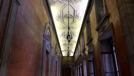 Tilt-down-shot-of-hallway-inside-of-Palacio-da-Bolsa-in-Porto
