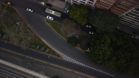 Crossroads-in-Buenos-Aires,-cars-drive-on-the-roads,-top-view
