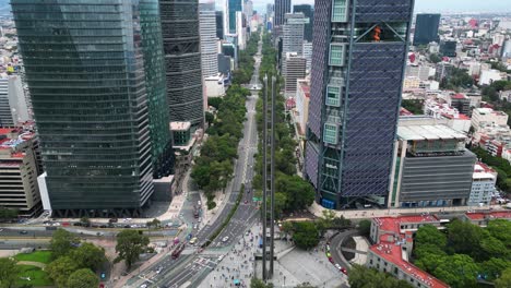 Skyline-Vistas:-droning-above-Paseo-de-la-Reforma-in-Mexico-City,-Mexico