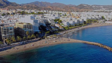 Drone-shot-from-seaside,filmingthe-beach-in-Marbella,-Spain