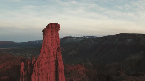 A-long-drone-shot-of-flying-through-the-grand-Fisher-Towers-in-Utah