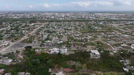 Drone-view-of-Brisas-del-Este-is-located-near-the-Residencial-Mirador-del-Este-and-Residencial-Paraíso-Oriental-areas,-Santo-Domingo
