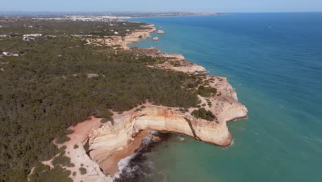 Establishing-high-angle-drone-view-of-benagil-algarve-portugal-coastline