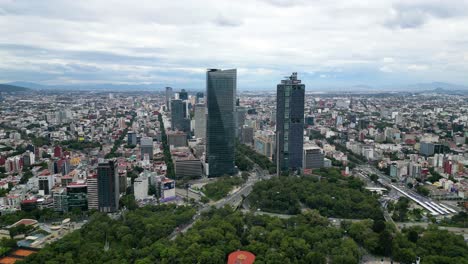 The-towers-of-Paseo-de-la-Reforma-and-surroundings-of-Chapultepec,-a-park-in-Mexico-City,-Mexico