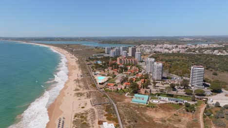 Aerial-orbit-around-apartment-hotel-getaway-vacation-buildings-in-Algarve-Portugal