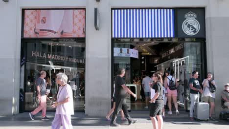 Shoppers-and-pedestrians-are-seen-at-the-Spanish-professional-football-team-Real-Madrid-Club-official-brand-store-in-Spain