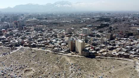 The-Contrasting-Landscapes-of-Kabul:-Buildings-and-Graveyard-from-the-Air