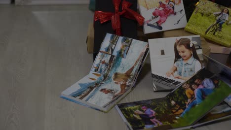 photobooks-near-the-New-Year-tree,-colored-as-a-gift-for-the-holiday.