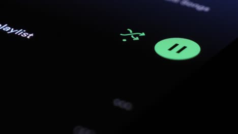 Tapping-Green-Pause-Icon-On-Touchscreen-On-Spotify