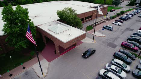 Cinematic-aerial-of-Entrance-Nichols-Library---Naperville-Public-Library,-Illinois-USA
