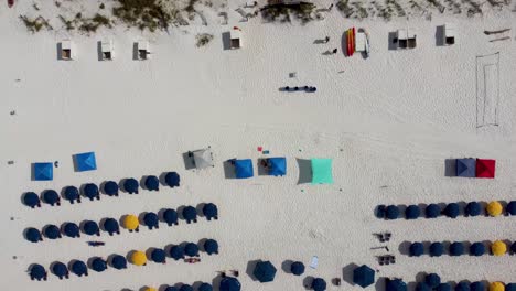 Aerial-View-of-Luxurious-Beach-Resort-or-Hotel-beach-access-with-chair,-colorful-umbrella-beach-service