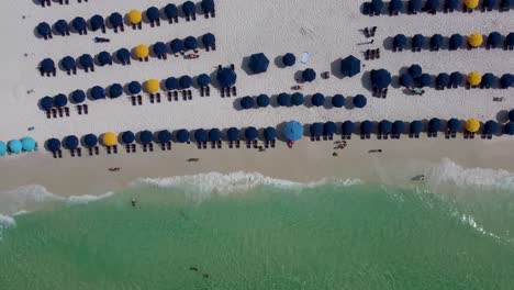 Aerial-top-view-of-beach-umbrellas-at-the-Luxurious-Beach-Resort