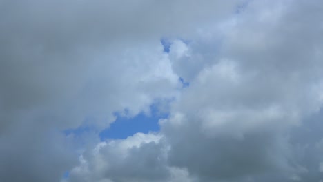 Cumulonimbus-clouds-gathering-and-blotting-out-blue-sky