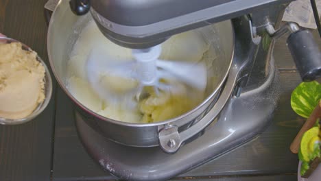 Mixing-sugar-and-butter-together-to-start-cookie-dough-on-a-medium-speed