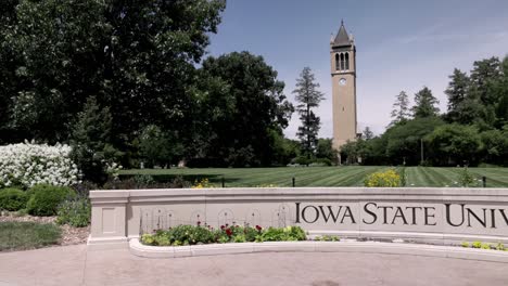Stanton-Memorial-Carillon-Campanile-on-the-campus-of-Iowa-State-University-in-Ames,-Iowa-with-gimbal-video-walking-sideways-right-to-left