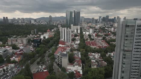 Aerial-view:-Downtown-Mexico-City-skyscrapers-under-overcast-sky