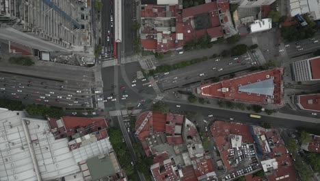 Aerial-hyperlapse:-Dense-city-traffic-driving-on-urban-street,-Mexico