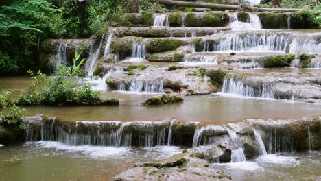 Deep-Forest-Pha-Charoen-Waterfall-in-the-national-park-is-a-popular-tourist-attraction-in-Phop-Phra-District,-Tak-Province,-Thailand