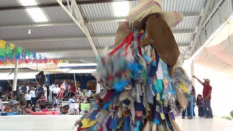 Slow-motion-close-up-shot-of-a-man-dancing-in-cultural-fashion-at-the-guelaguetza-festival