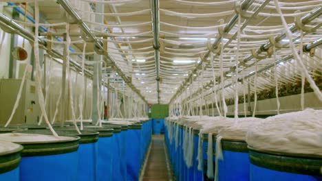 Cotton-thread-spinning-machines,-interior-of-a-cotton-processing-factory