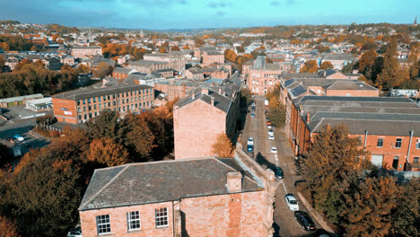 Aerial-drone-footage-of-the-English-market-town-centre-of-Dewsbury-in-West-Yorkshire-in-the-UK-showing-the-historical-town-centre-and-the-Dewsbury-townhall