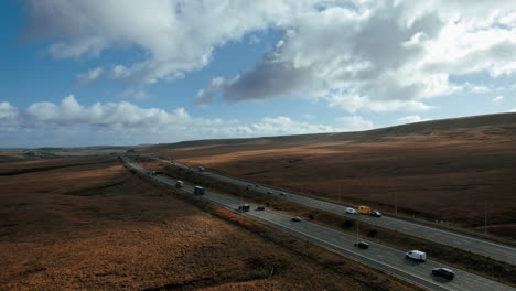 Cinematic-Aerial-footage-view-of-M62-Motorway,-Saddleworth,-Windy-Hill,-UK