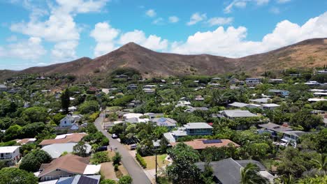 Aerial-over-Lanikai-village,-Oahu,-Hawaii.-4K30-Drone