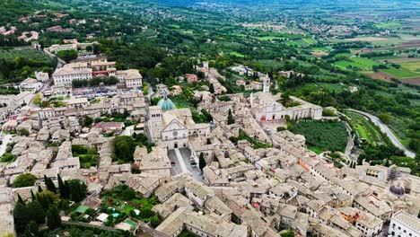 Aerial-View-Of-Assisi-Town-And-Cathedral-In-Daytime-In-Umbria,-Italy