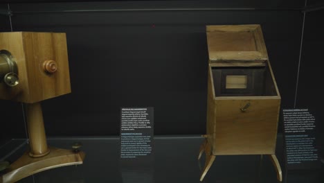 exhibition-of-old-photographic-cameras,-showcasing-the-evolution-of-photography-technology-over-time-Inside-National-Technical-Museum-in-Prague,-Czech-Republic