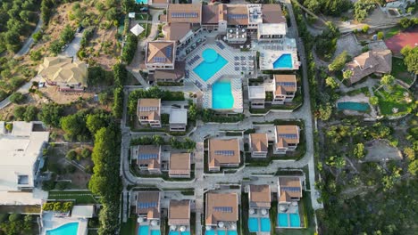 Holiday-Resort-Hotel-with-swimming-pool-villa's-in-Syvota,-Greece---Aerial