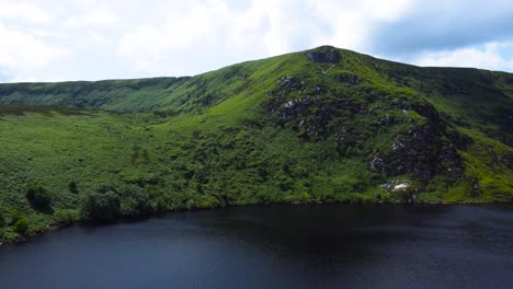 Aerial-Descending-Approach-towards-a-Beautiful-Mountain-Lake-in-Ireland