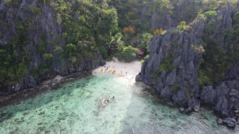 Aerial-Vista:-Drone's-Eye-View-of-Miniloc-Island's-Enchanting-Small-Lagoon-in-El-Nido,-Philippines