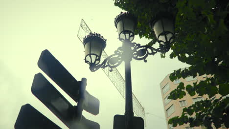 Old-Ornamental-City-Street-Lamp-in-Rain