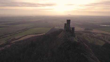 -Medieval-evil-twin-towers-castle-from-middle-ages,-establishing-drone-view