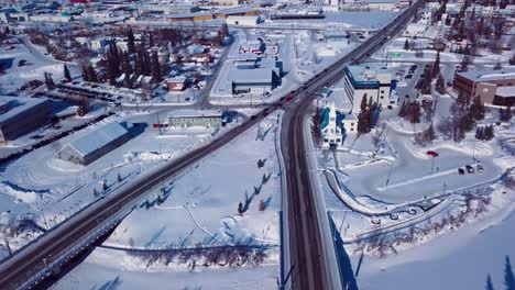 4K-Drone-Video-of-Immaculate-Conception-Catholic-Parish-on-the-Banks-of-the-Frozen-Chena-River-in-Downtown-Fairbanks-Alaska-on-Snowy-Winter-Day