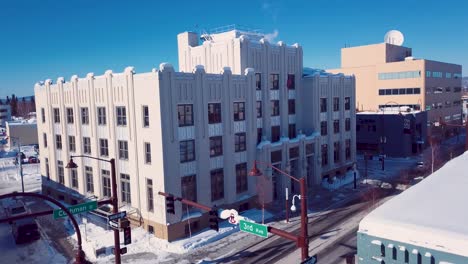 4K-Drone-Video-of-Historic-Courthouse-Square-Building-in-Downtown-Fairbanks-Alaska-on-Snowy-Winter-Day